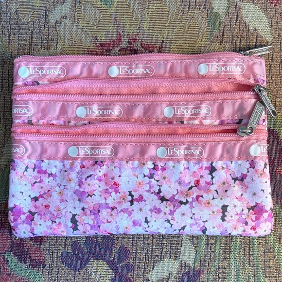 Lesportsac Handbags - LeSportsac Pink and White Floral Pouch